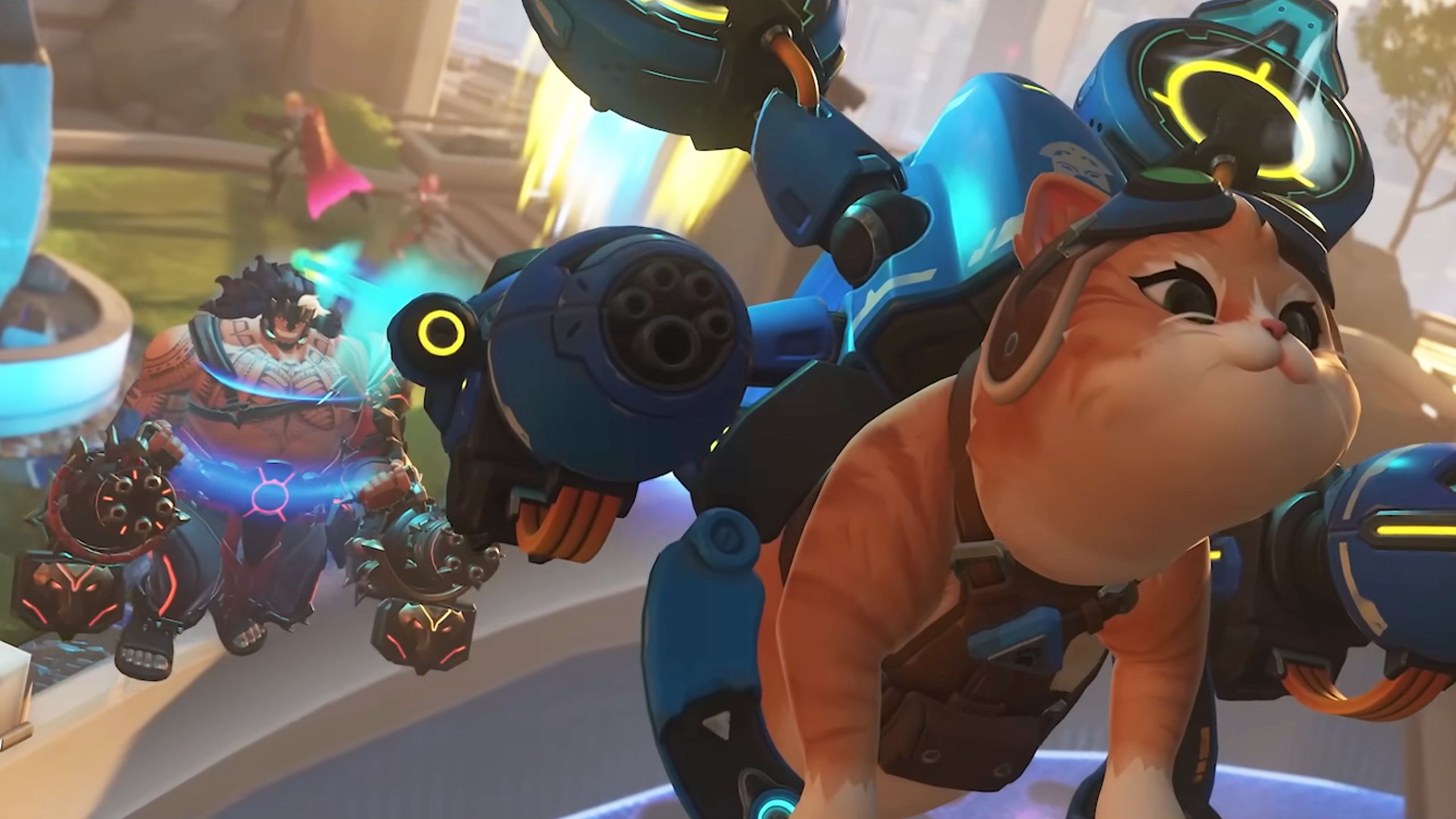 Overwatch 2 in-game screenshot of the orange tabby Jetpack Cat hero in a flight harness with blue jetpack thrusters, carrying the blue Bastion robot in turret mode with its gatling barrel extended, above a sunlit map with another hero in the background.